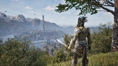 Bethesda A character in armour stands overlooking a castle. It looks more like a modern game rather than one from 20 years ago.