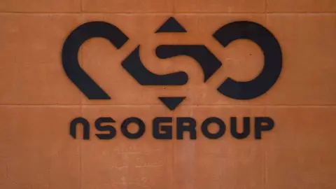Getty Images The NSO logo on its HQ in Israel