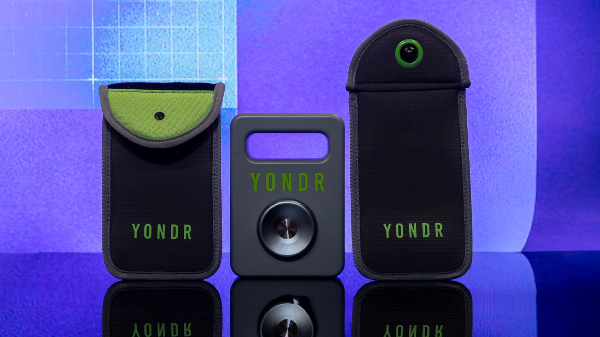 A closed Yondr pouch, a square Yondr unlocking magnet, and an open Yondr pouch in front of a blue and purple background.
