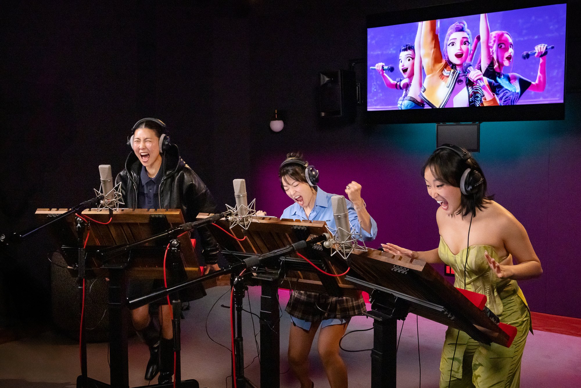 May Hong, Arden Cho, and Ji-young Yoo in the recording booth for "K-pop Demon Hunters."