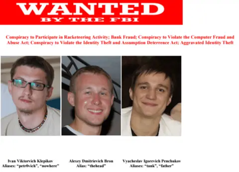 FBI The headline says "Wanted by the FBI"; underneath it says "conspiracy to participate in racketeering activity; bank fraud. conspiracy to violate the computer fraud and abuse act; conspiracy to violate the identity theft and assumption deterrence act; aggravated identity theft." Under that, there are images of three men and their names: Ivan Viktorovich Klepikov, aliases petrovich, nowhere; Alexey Dmitrievich Bron, alias "the head"; Vyacheslav Igorevich Penchukov, aliases tank, father.