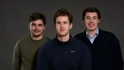 Adam Isfendiyar Throxy Founders standing next to each other. Pablo Jiménez de Parga Ramos wears a green jumper. Arnau Ayerbe wears a navy fleece and Bergen Merey has a black v-necked top.